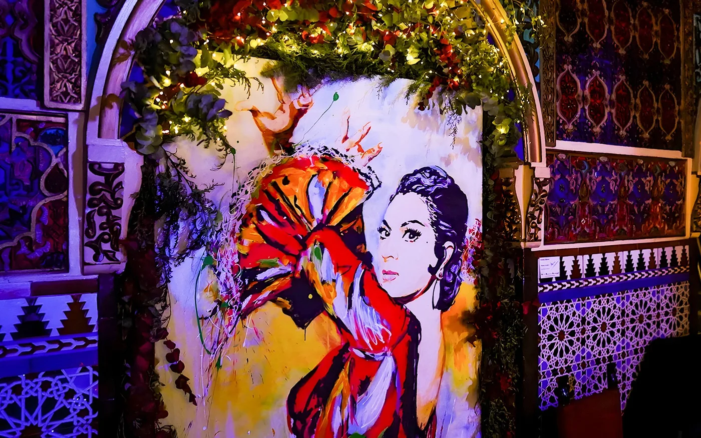 Decorative flamenco artwork inside Torres Bermejas